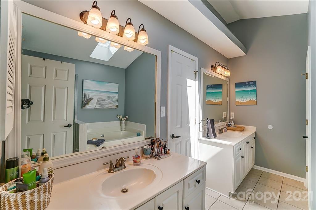 744 West Cheval Drive Fort Mill, SC 29708 - Photo 25 of 47 a bathroom with a sink double vanity and a mirror