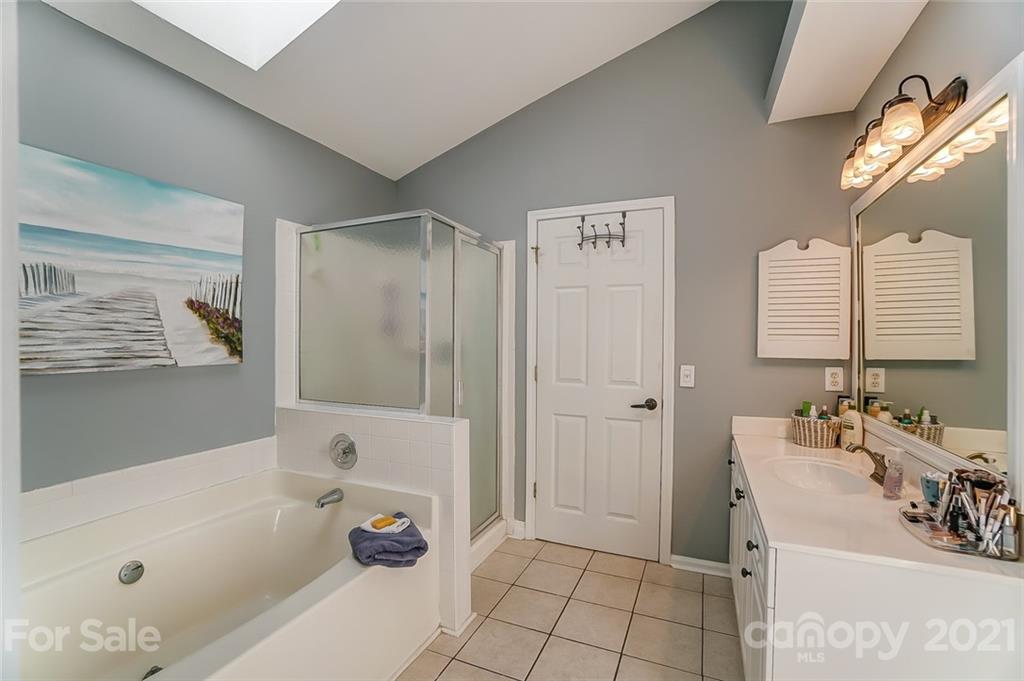 744 West Cheval Drive Fort Mill, SC 29708 - Photo 26 of 47 a bathroom with a sink a toilet and shower