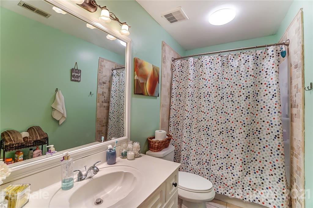 744 West Cheval Drive Fort Mill, SC 29708 - Photo 31 of 47 a bathroom with a sink toilet and shower