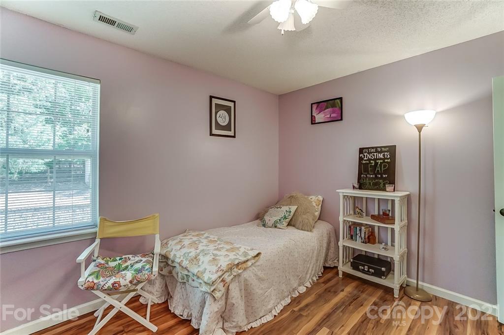 744 West Cheval Drive Fort Mill, SC 29708 - Photo 33 of 47 a bedroom with a bed and a window