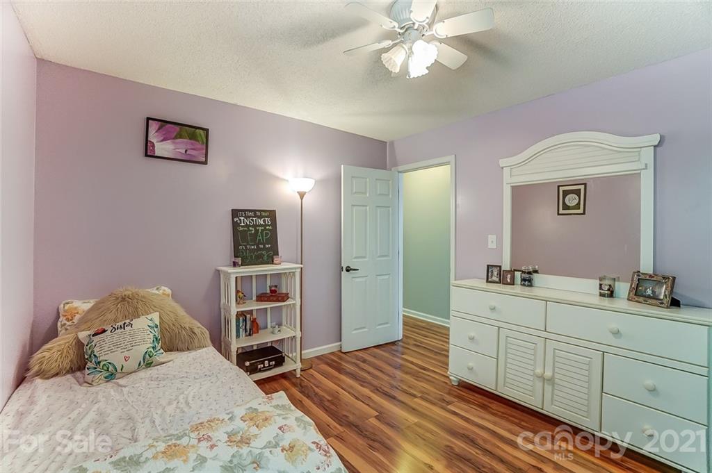 744 West Cheval Drive Fort Mill, SC 29708 - Photo 34 of 47 a bedroom with a bed and a dresser
