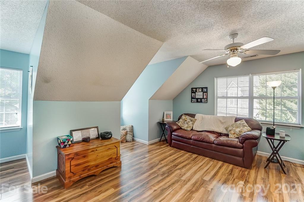 744 West Cheval Drive Fort Mill, SC 29708 - Photo 35 of 47 a living room with furniture and a large window