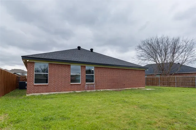 front view of house with a yard