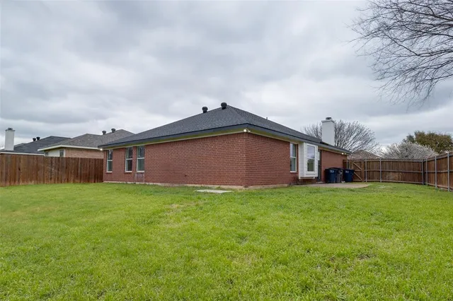 a house view with garden space