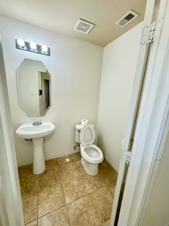 a bathroom with a sink and a toilet
