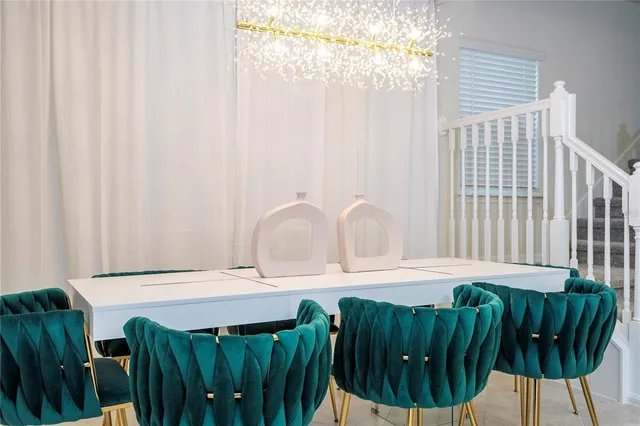 a bathroom with a shower sink vanity and toilet