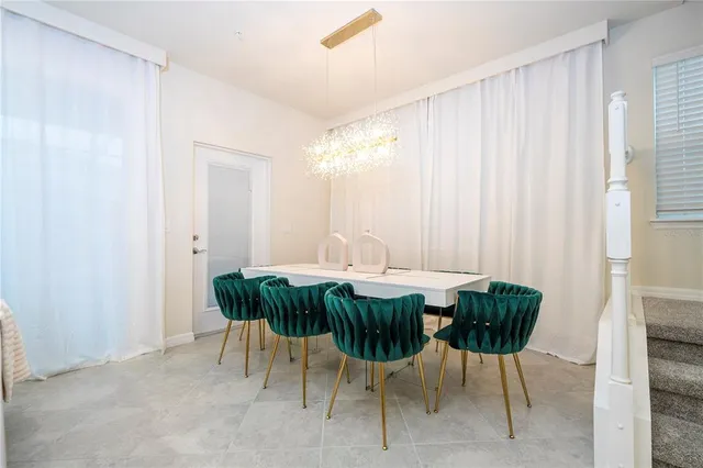 a large white bed in a white room