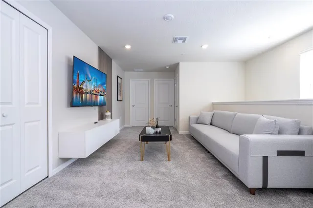 a bathroom with a shower and toilet