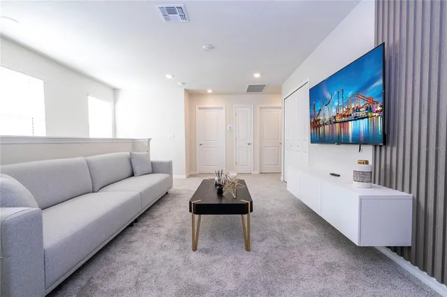 a view of swimming pool with outdoor seating