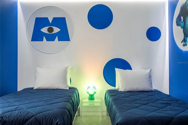 a view of swimming pool with outdoor seating and house in the background