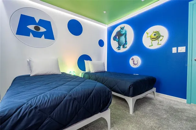 a view of a swimming pool with sitting area