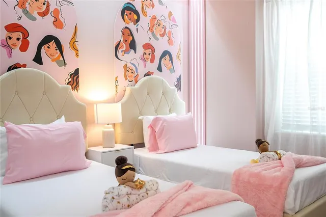 a view of a house with swimming pool and sitting area