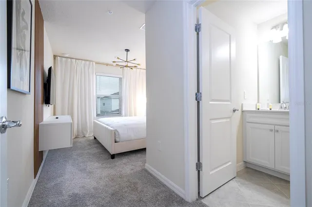 a view of a chairs and table in backyard