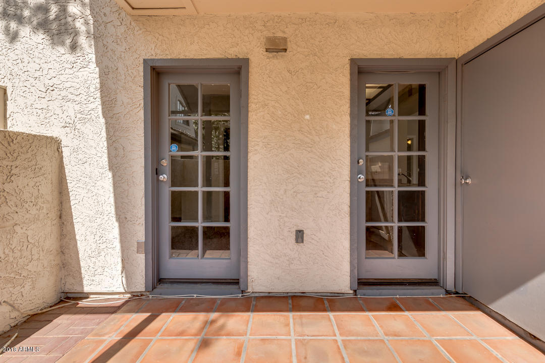 1222 West Baseline Road, Unit 112 Tempe, AZ 85283 - Photo 19 of 26 a view of front door of a house