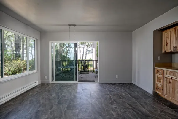 a view of livingroom with furniture wooden floor and window