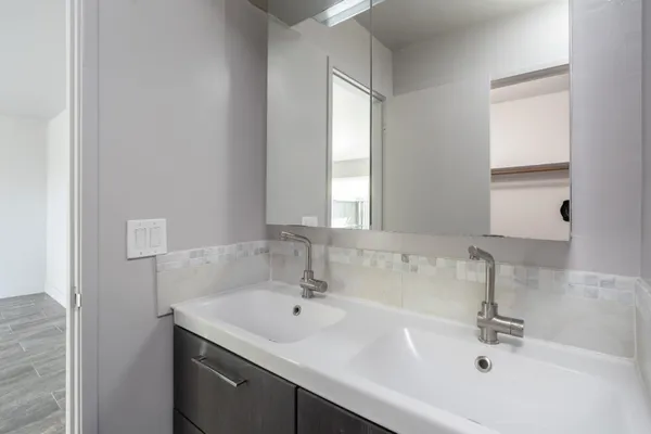 a bathroom with a sink and a bathtub