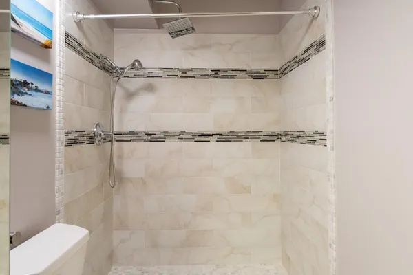 a close view of a shower in bathroom