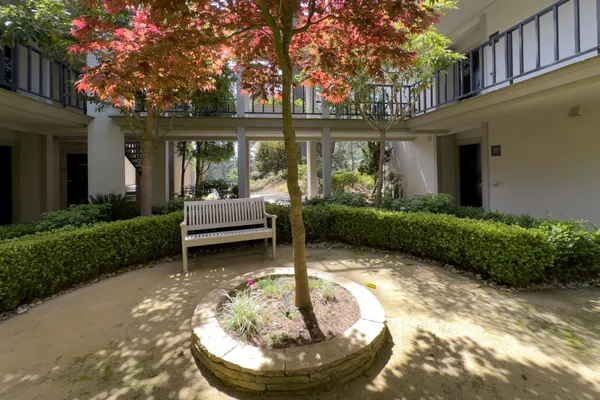 a view of a house with furniture