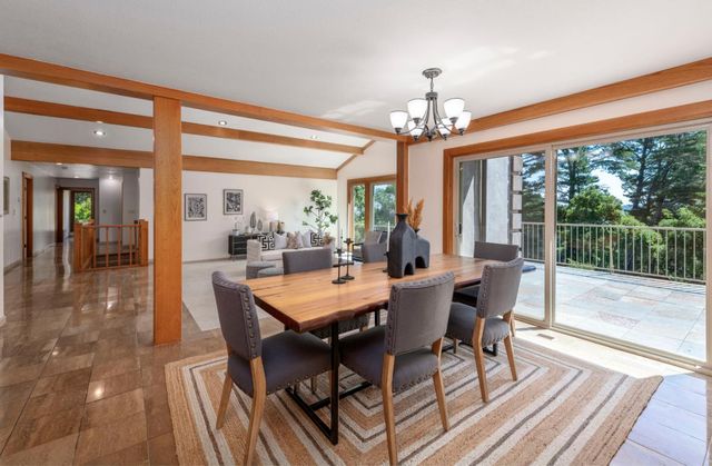 a kitchen with stainless steel appliances a refrigerator a sink and stove