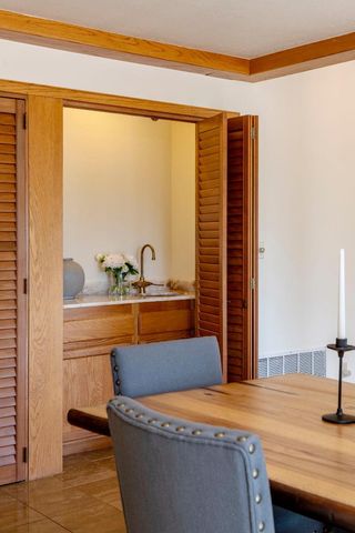 a workspace with furniture and window