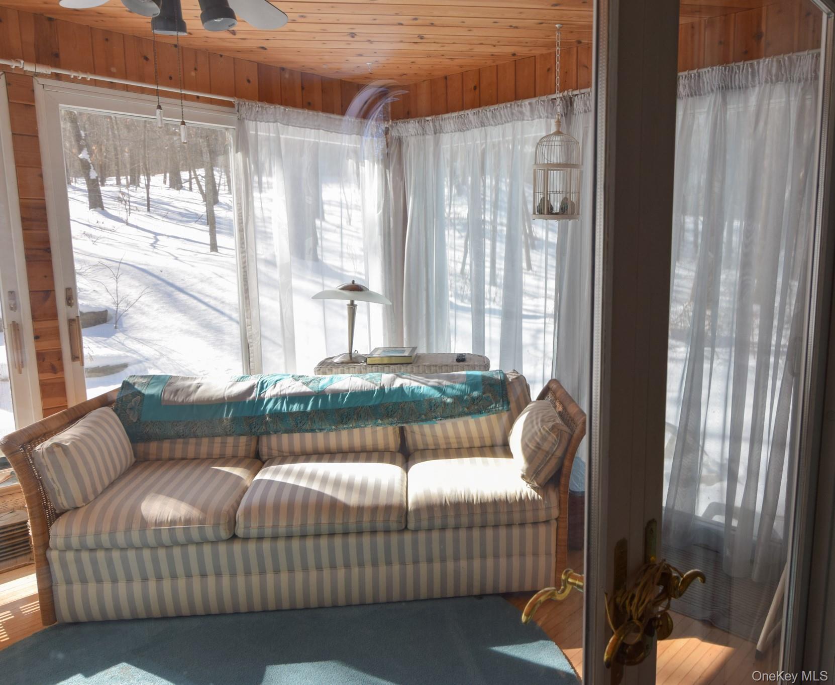 94 Hilltop Road Rhinebeck, NY 12572 - Photo 12 of 28 a bedroom with furniture and a large window