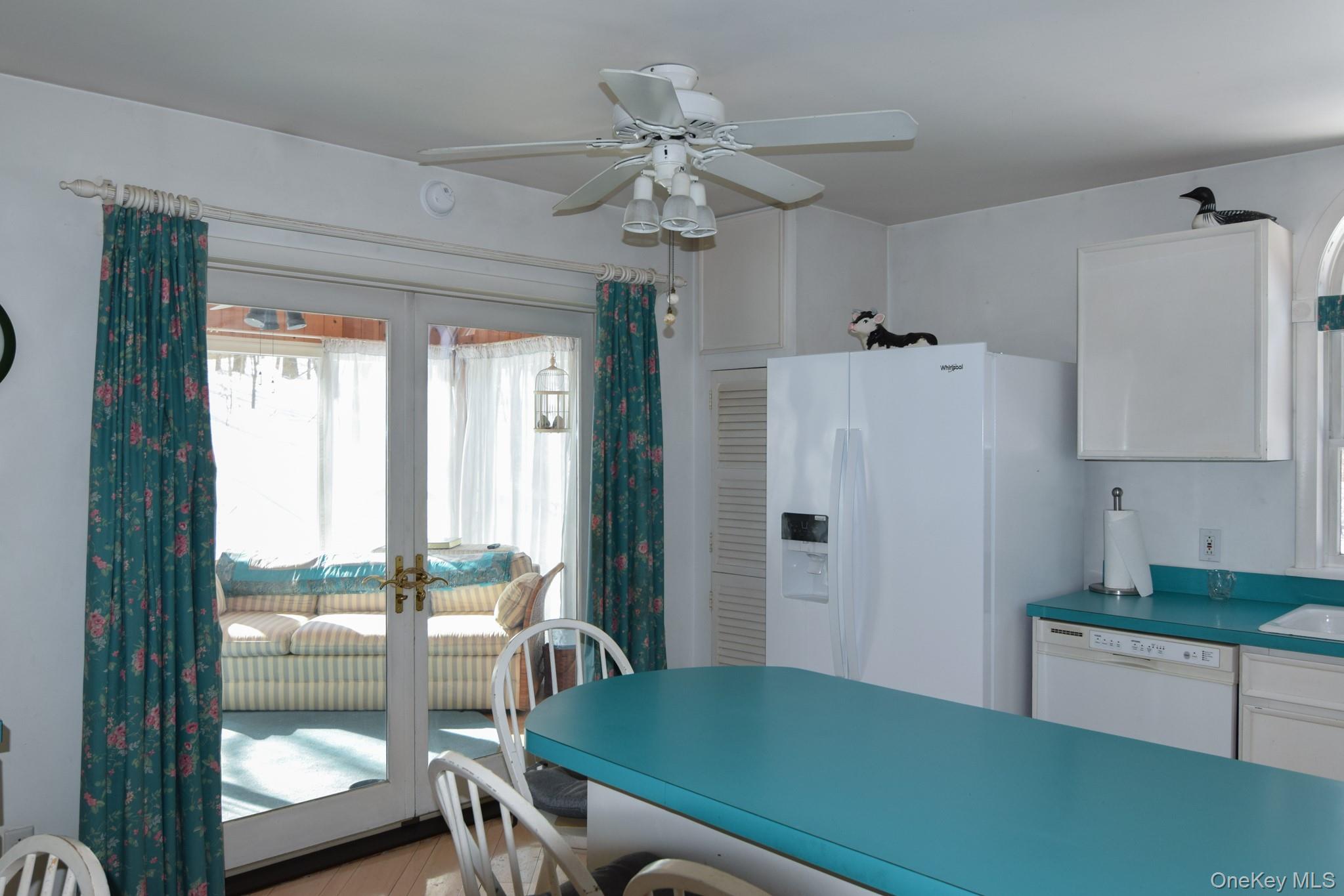 94 Hilltop Road Rhinebeck, NY 12572 - Photo 9 of 28 a room with a bed and a chandelier