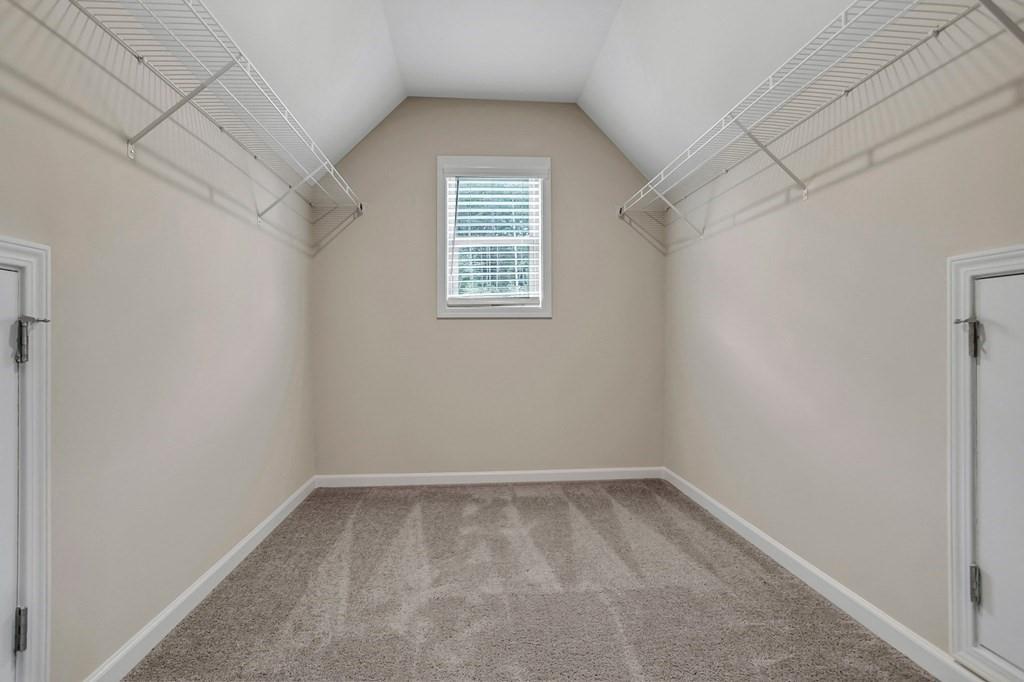 1852 Auburn Road, Unit RIVERBROOK Dacula, GA 30019 - Photo 13 of 31 a view of a small space with a window