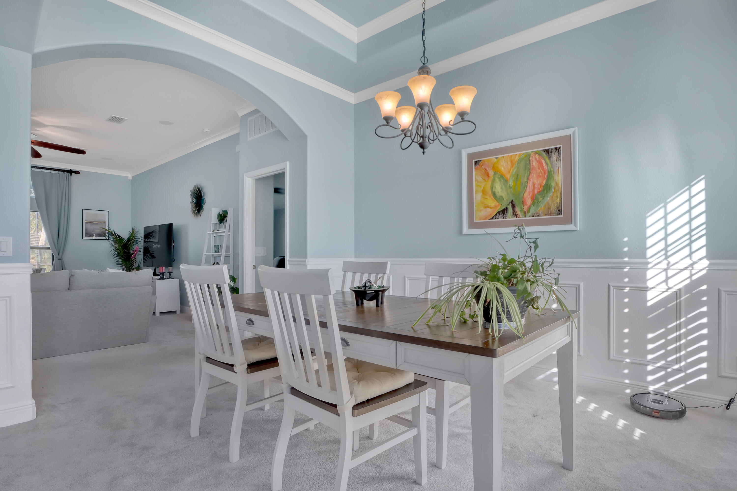 1358 Outrigger Circle Rockledge, FL 32955 - Photo 12 of 48 a view of a dining room with furniture and chandelier
