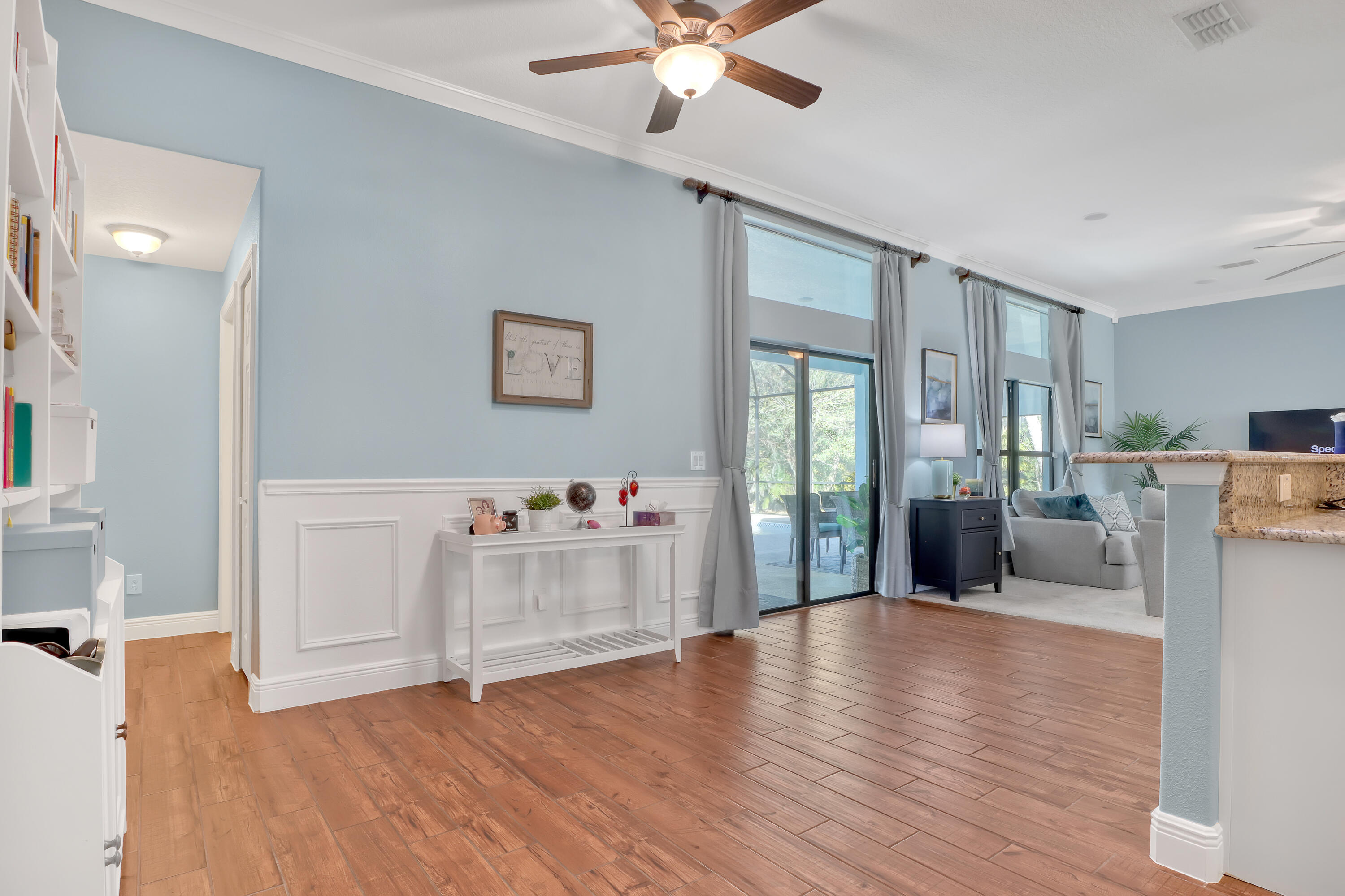 1358 Outrigger Circle Rockledge, FL 32955 - Photo 14 of 48 a view of livingroom with furniture and wooden floor
