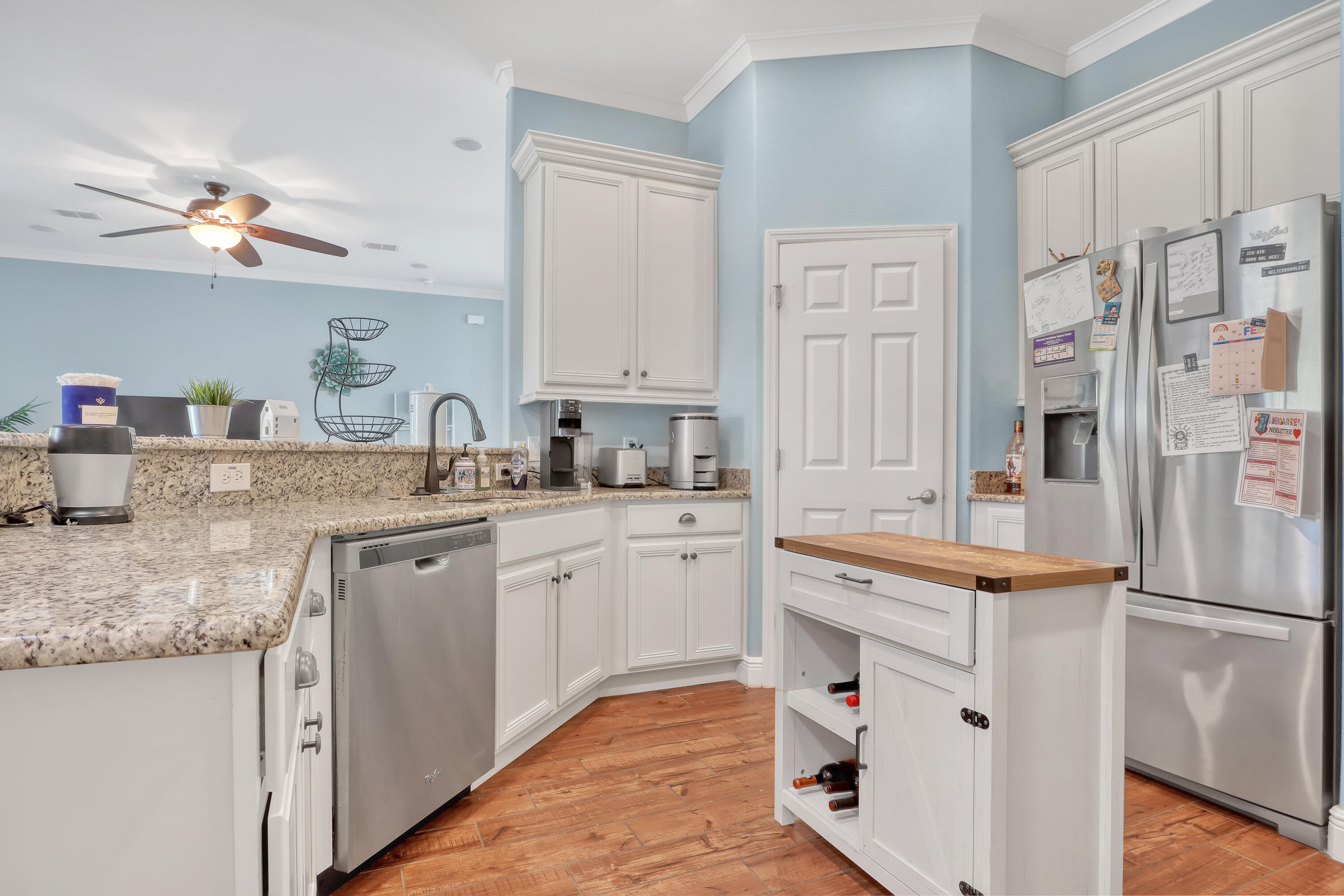 1358 Outrigger Circle Rockledge, FL 32955 - Photo 16 of 48 a kitchen with stainless steel appliances granite countertop a sink stove and refrigerator