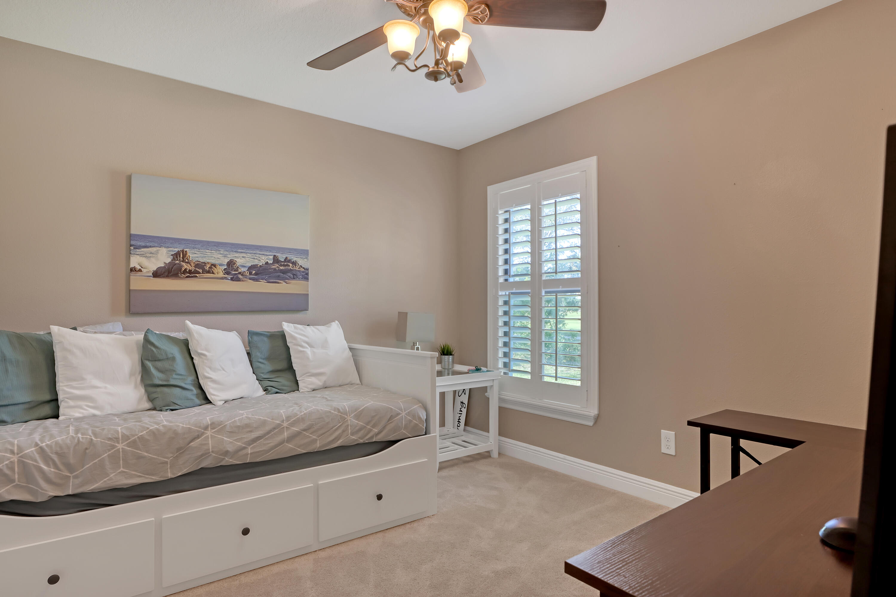 1358 Outrigger Circle Rockledge, FL 32955 - Photo 30 of 48 a living room with furniture and a window