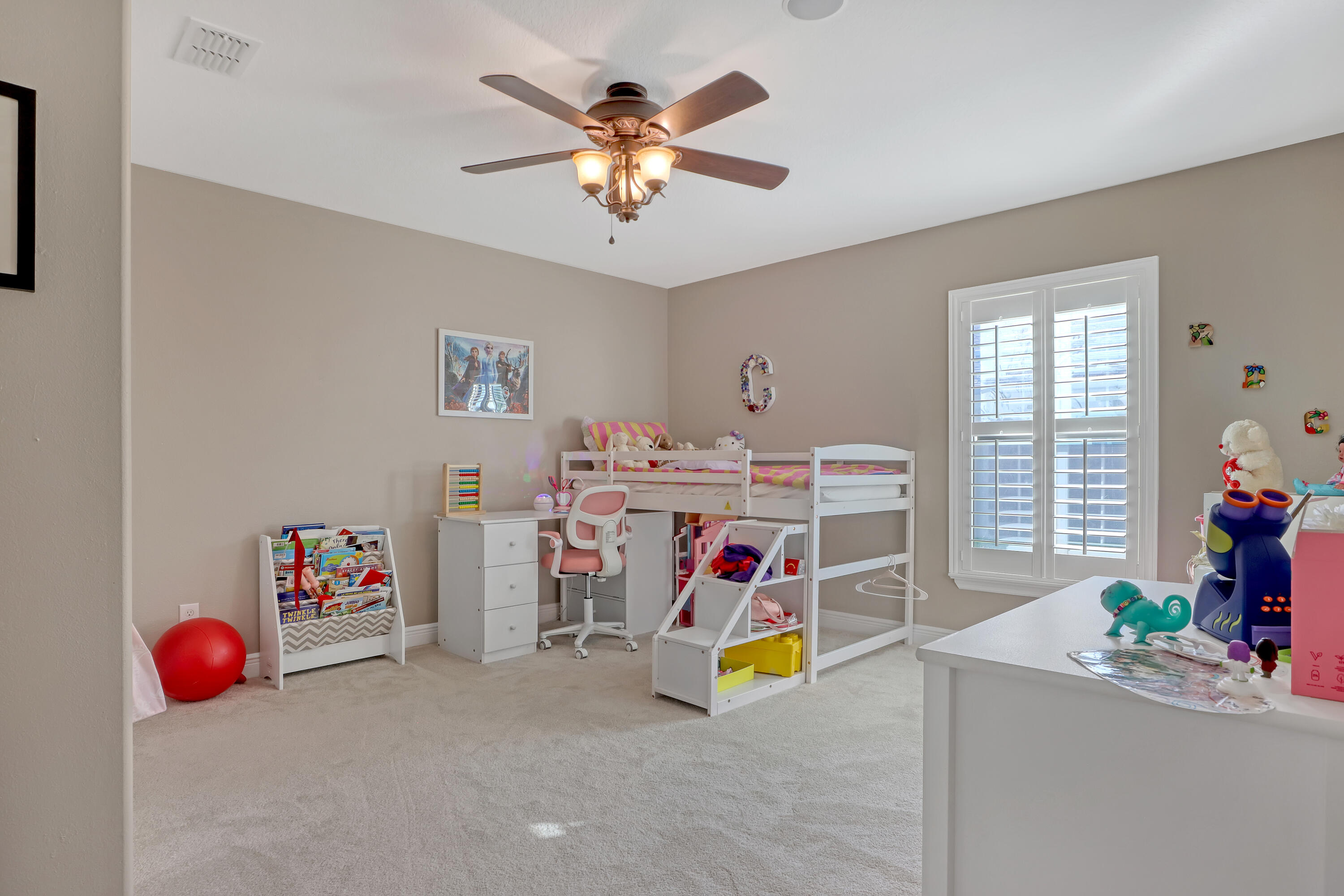 1358 Outrigger Circle Rockledge, FL 32955 - Photo 33 of 48 a utility room with toys and ceiling fan