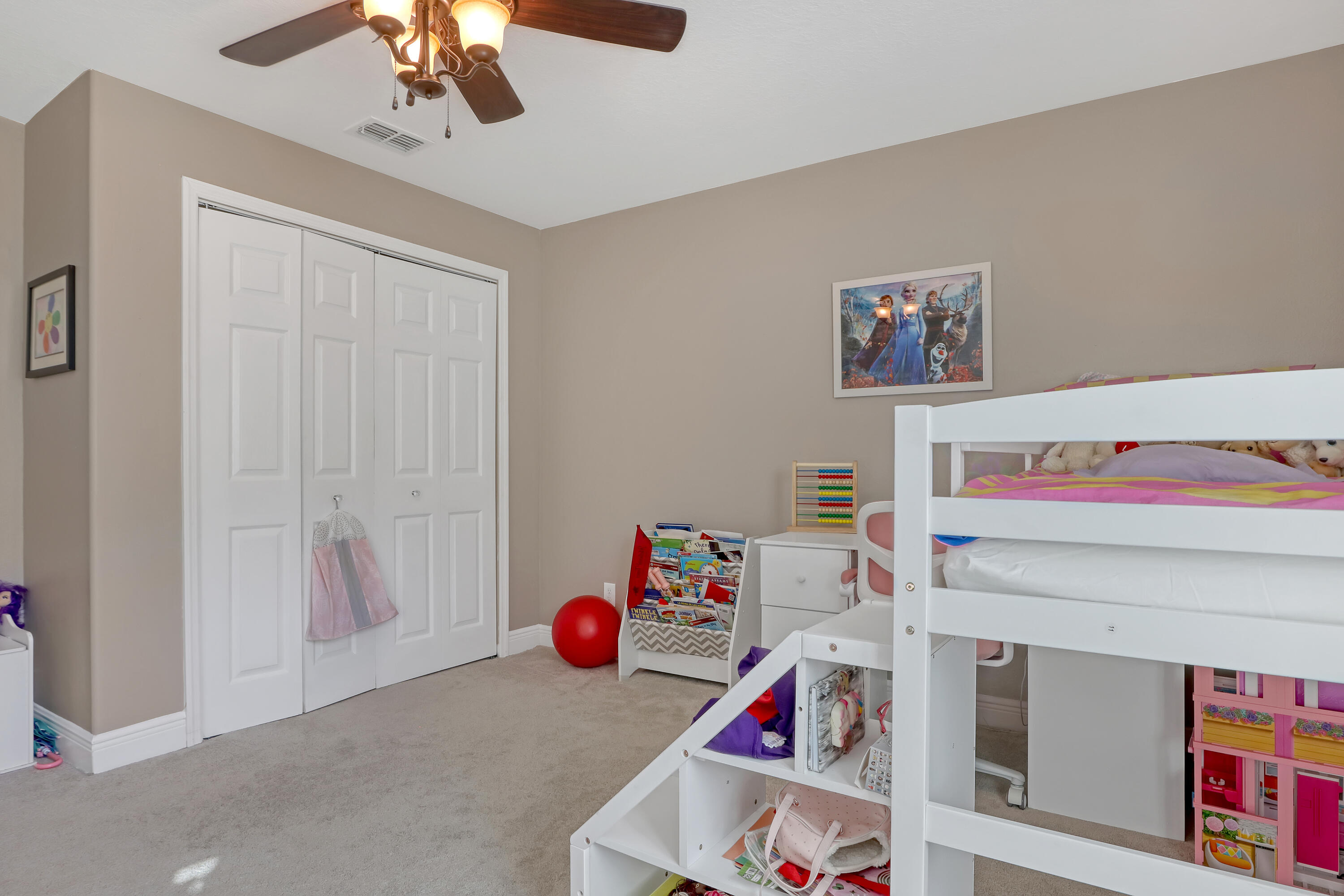 1358 Outrigger Circle Rockledge, FL 32955 - Photo 34 of 48 a utility room with toys and ceiling fan