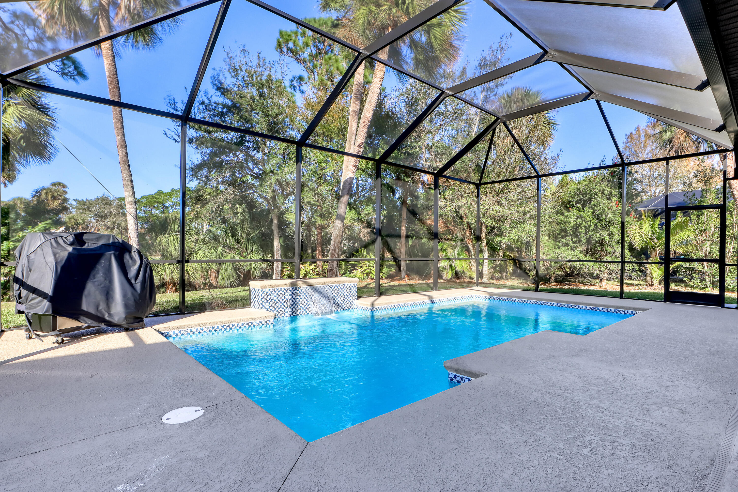1358 Outrigger Circle Rockledge, FL 32955 - Photo 41 of 48 a view of a swimming pool with a patio and a yard