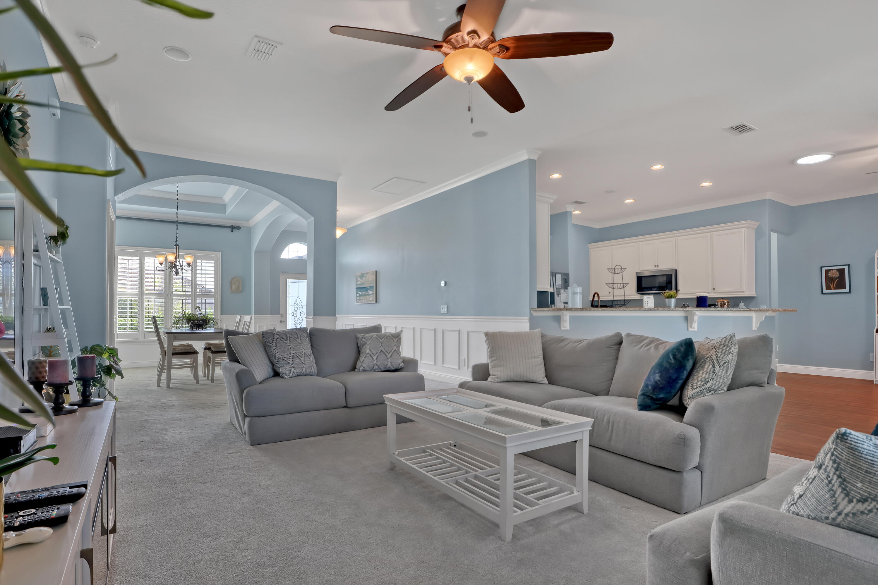 1358 Outrigger Circle Rockledge, FL 32955 - Photo 8 of 48 a living room with furniture and kitchen view