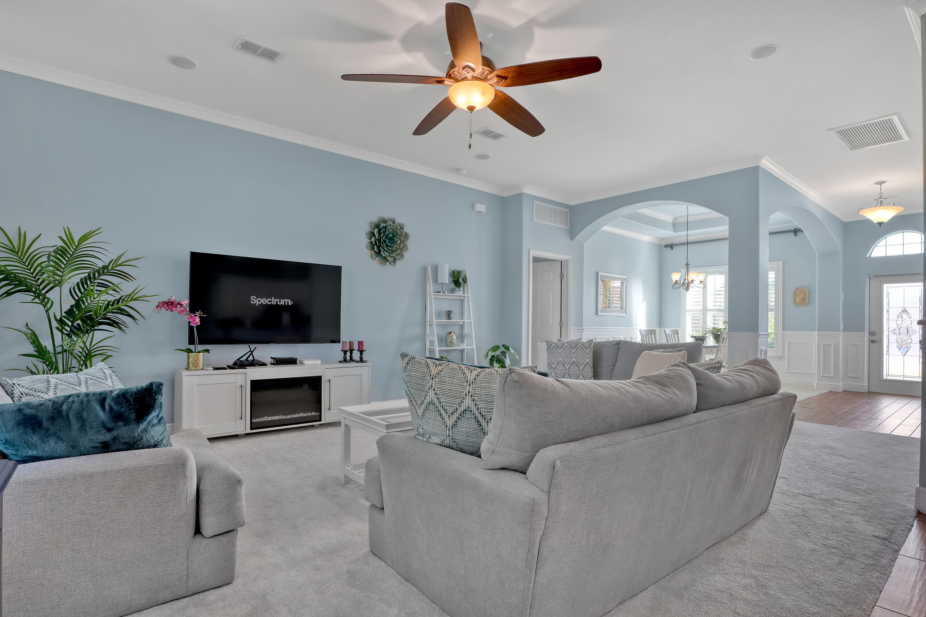 1358 Outrigger Circle Rockledge, FL 32955 - Photo 9 of 48 a living room with furniture and a flat screen tv
