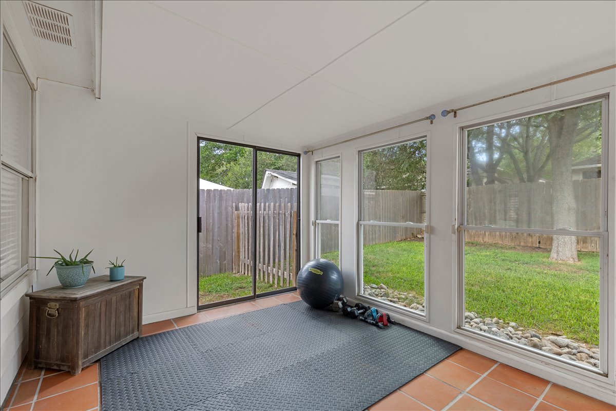 9012 Meacham Way Austin, TX 78749 - Photo 25 of 34 Enclosed patio with terracotta tile flooring and a white ceiling