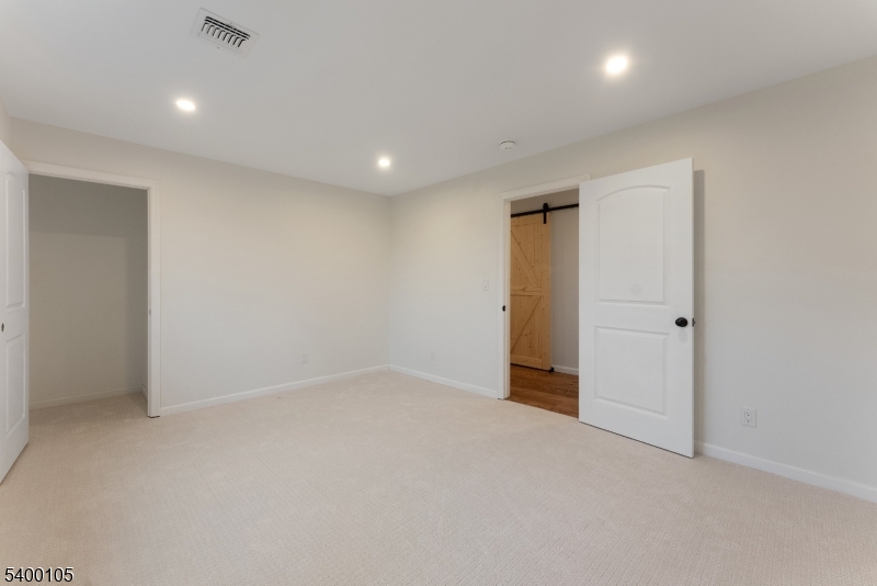 11 Furnace Road Chester, NJ 07930 - Photo 19 of 39 an empty room with closet and a hallway
