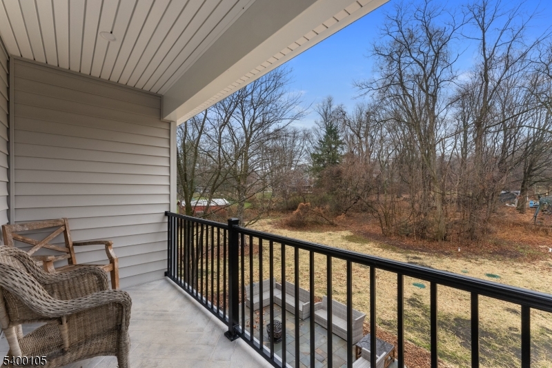 11 Furnace Road Chester, NJ 07930 - Photo 27 of 39 a balcony with wooden floor and fence