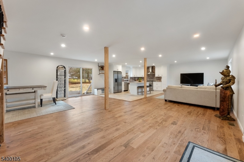 11 Furnace Road Chester, NJ 07930 - Photo 9 of 39 a living room with furniture and a flat screen tv