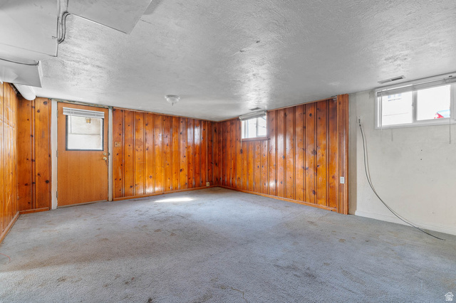 7689 Locust Street Midvale, UT 84047 - Photo 14 of 26 Lower level, Entrance and living room