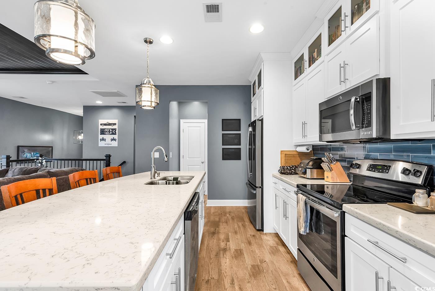 28 Pinnacle Drive Murrells Inlet, SC 29576 - Photo 12 of 40 Kitchen with sink, stainless steel appliances, dec
