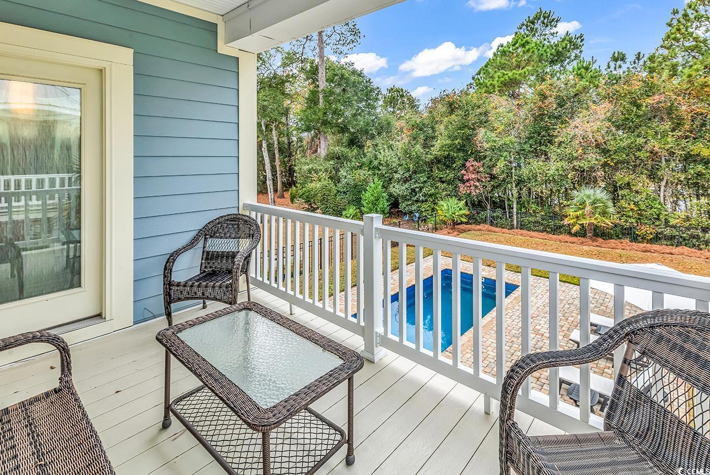 28 Pinnacle Drive Murrells Inlet, SC 29576 - Photo 17 of 40 Wooden deck with a pool