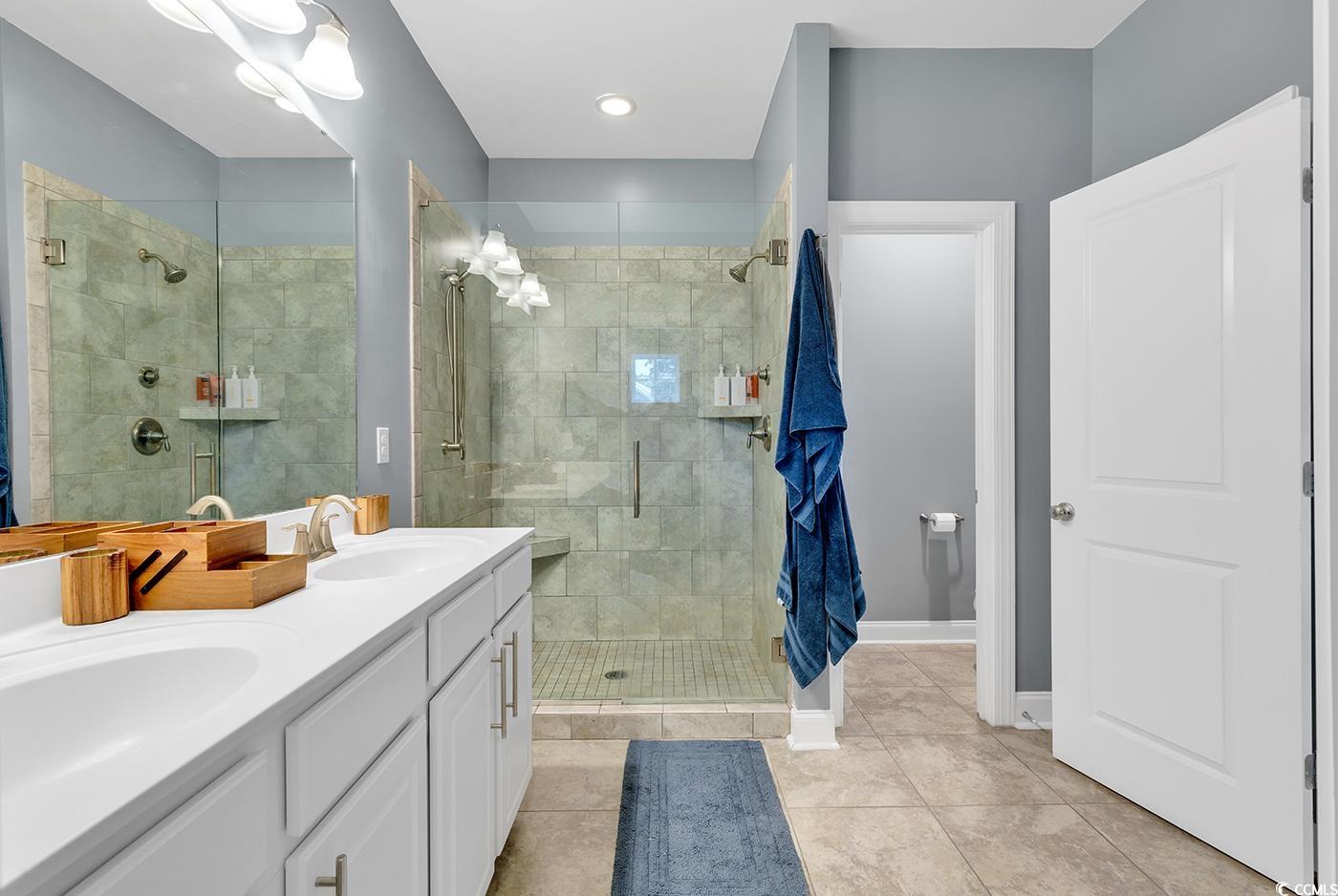 28 Pinnacle Drive Murrells Inlet, SC 29576 - Photo 21 of 40 Bathroom featuring tile patterned floors, vanity,
