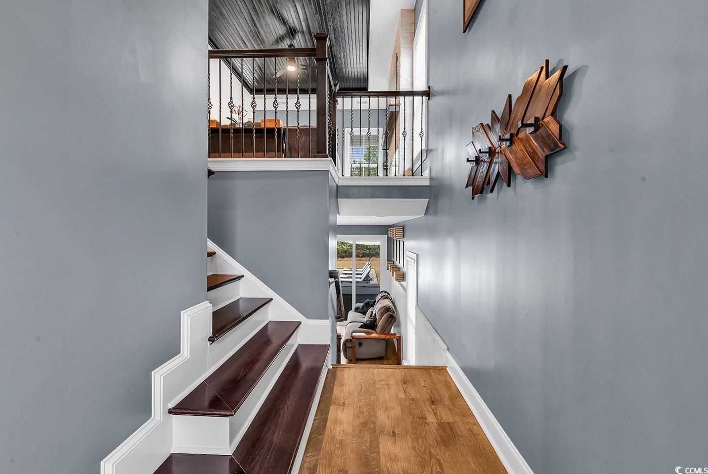 28 Pinnacle Drive Murrells Inlet, SC 29576 - Photo 24 of 40 Staircase featuring hardwood / wood-style floors