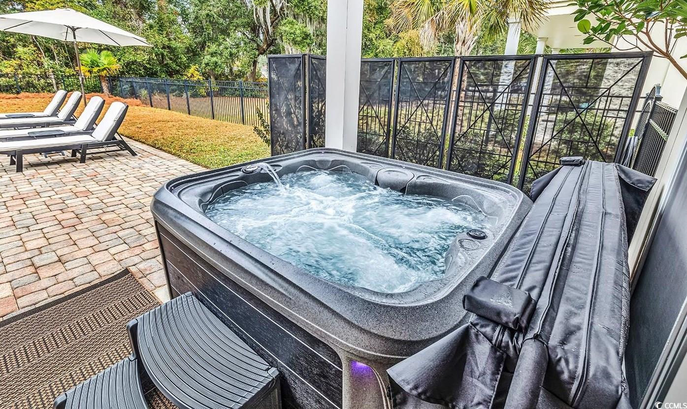 28 Pinnacle Drive Murrells Inlet, SC 29576 - Photo 3 of 40 View of patio featuring a hot tub