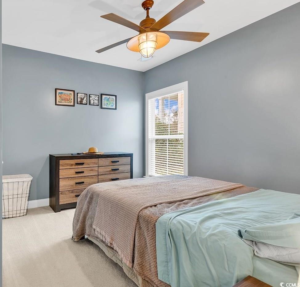 28 Pinnacle Drive Murrells Inlet, SC 29576 - Photo 31 of 40 Bedroom with ceiling fan and light carpet