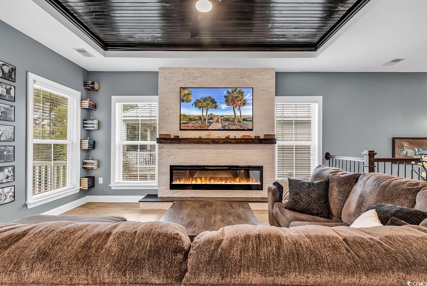 28 Pinnacle Drive Murrells Inlet, SC 29576 - Photo 7 of 40 Living room featuring a fireplace, hardwood / wood