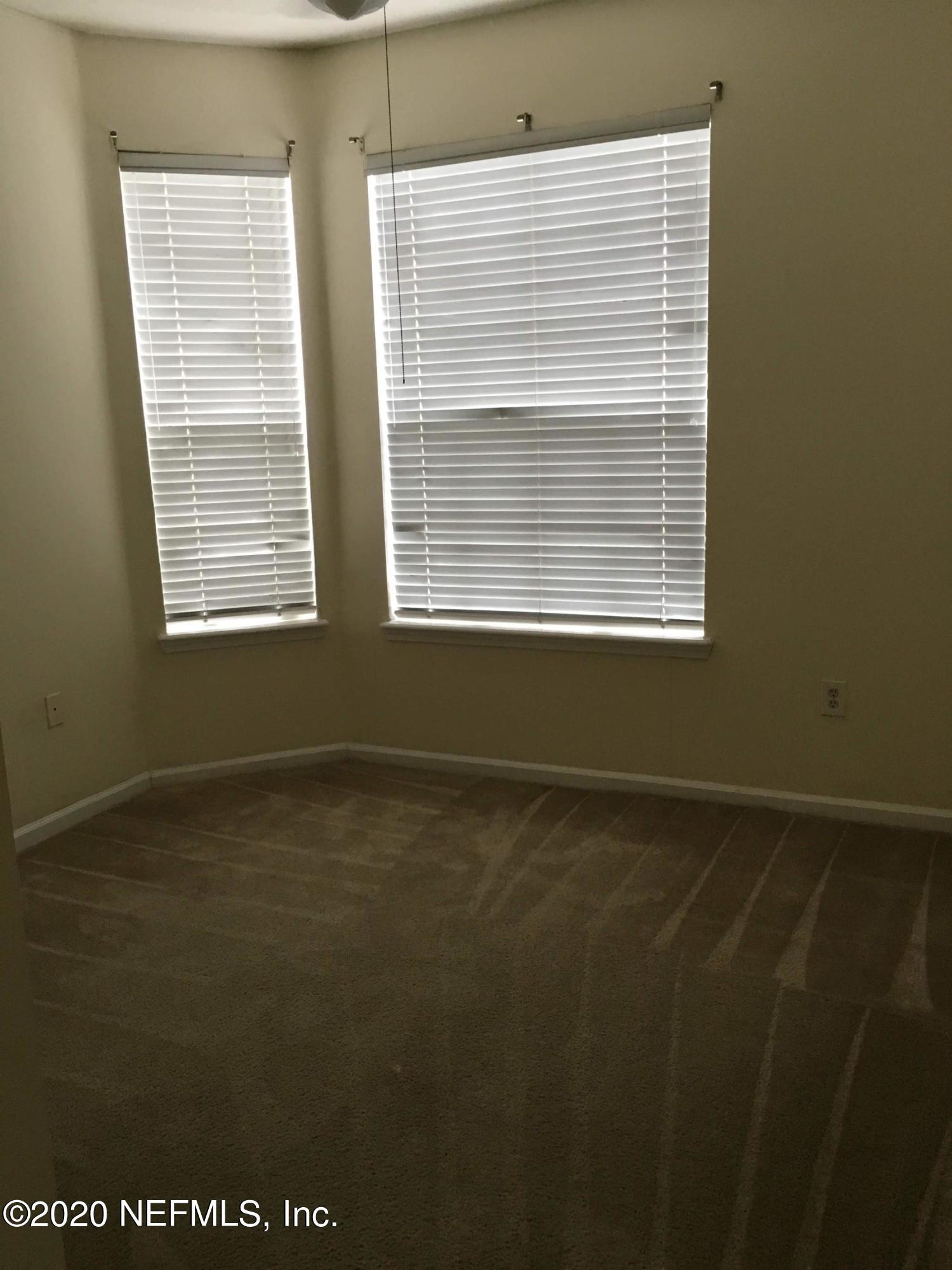 10550 Baymeadows Road, Unit 806 Jacksonville, FL 32256 - Photo 12 of 30 a view of an empty room with a window