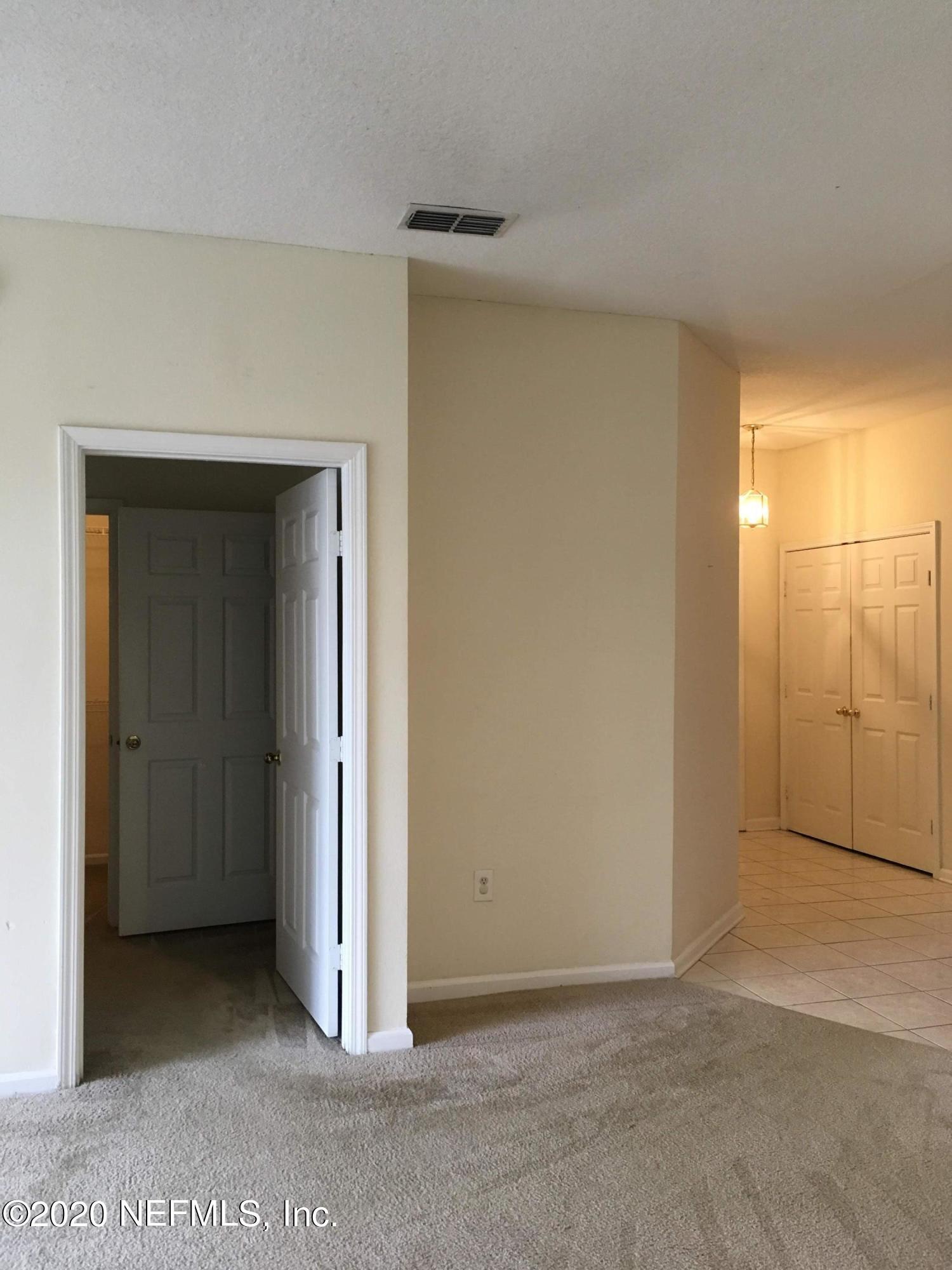 10550 Baymeadows Road, Unit 806 Jacksonville, FL 32256 - Photo 21 of 30 a view of a room with a hallway